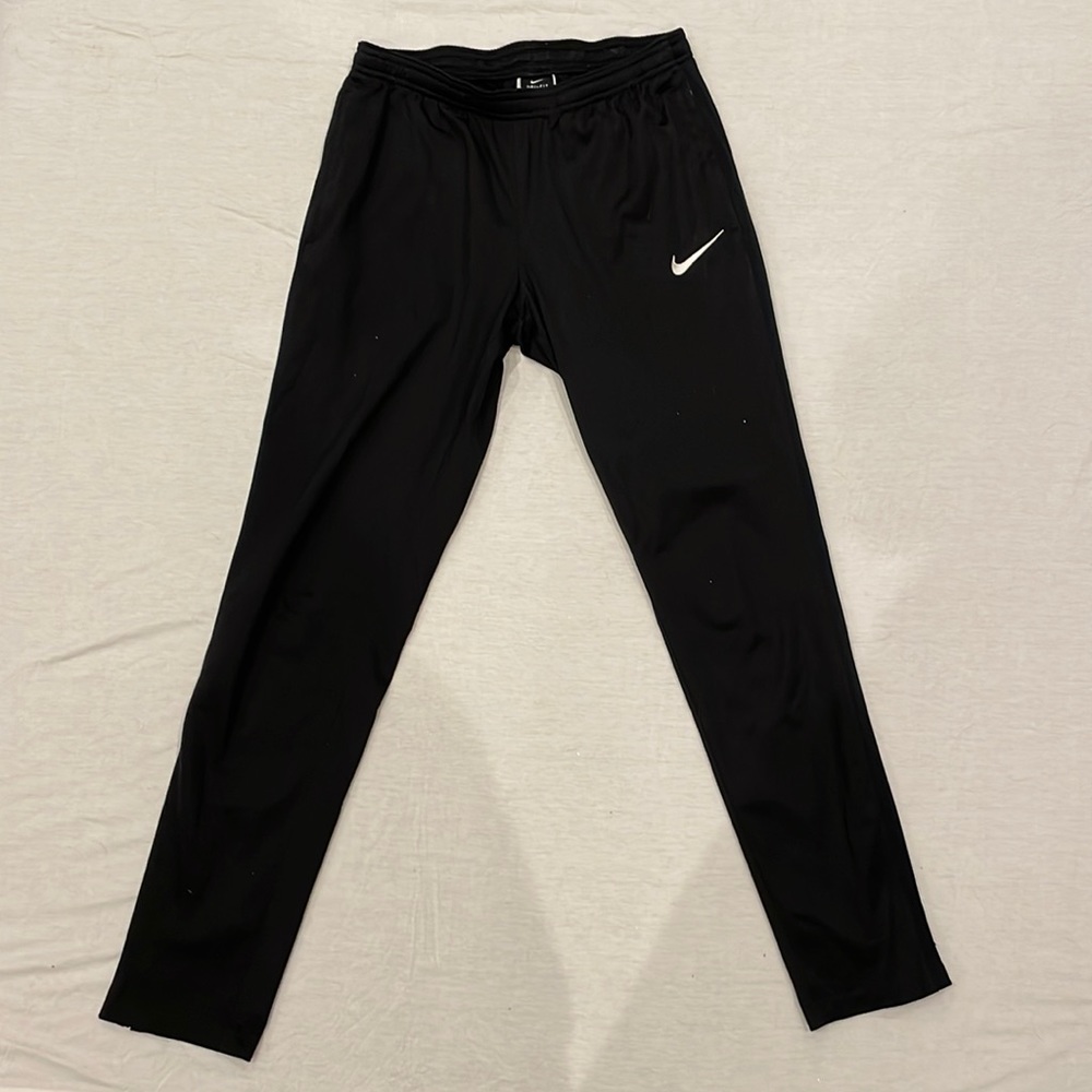 Nike women’s drifit pants size small and zippers at the end of legs